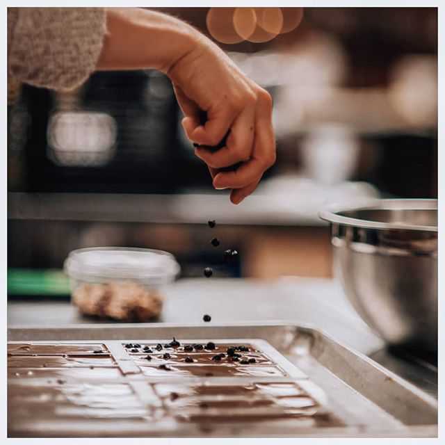 Sprinkling Blueberries in Chocolate